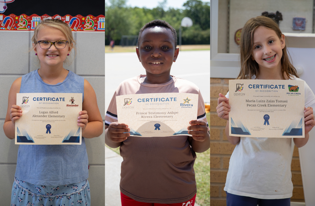 Students holding certificates